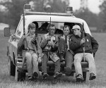 Lawmen Hitch a Ride Lawmen catch a ride from the field where Willie Joe Taylor fell.